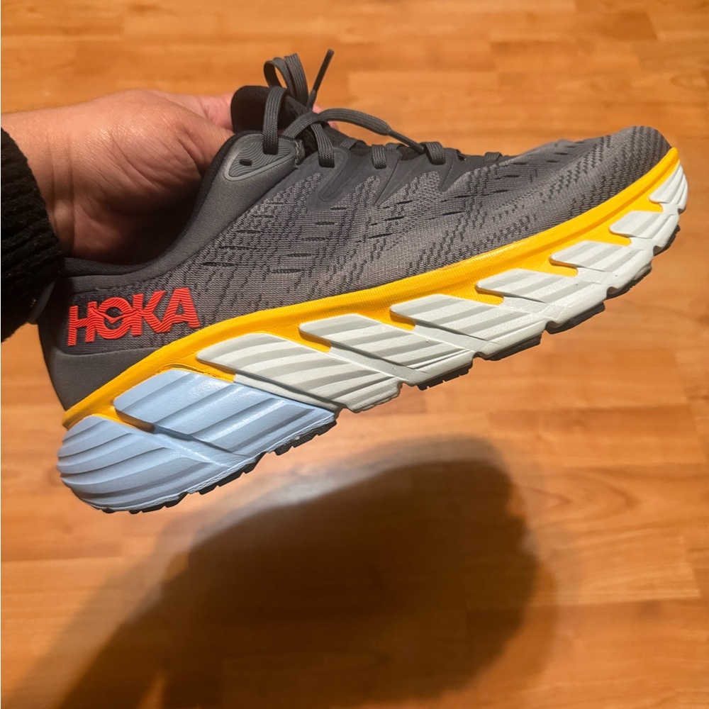 Hoka Gray Sneakers with Red, Yellow, and Light Blue Accents
